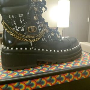 Kurt Geiger Black Combat Boots with Gold Chain and White Accents